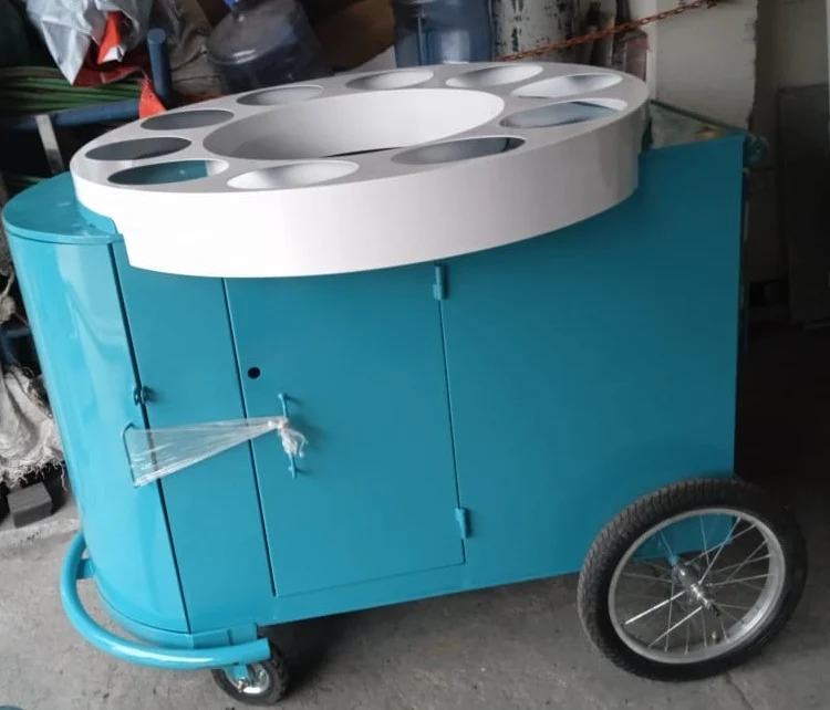 Carro de ventas azul con ruedas